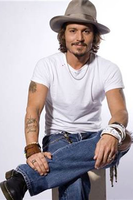 Johnny Depp sick of good looks