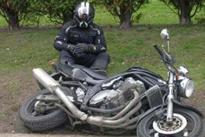 US daredevil flies Harley motorcycle 55 metres to record in Sydney