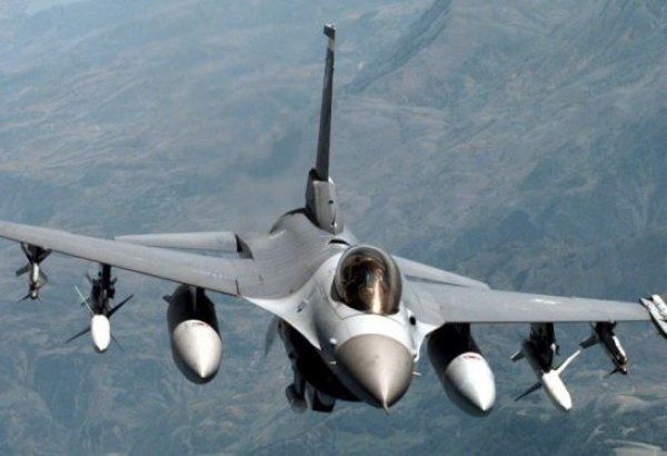 Syrian jets bomb area near Homs to break rebel siege