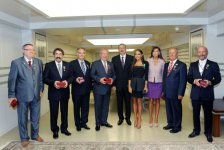 President Ilham Aliyev hands out Dostlug order and Taraggi medal to public figures (PHOTO)