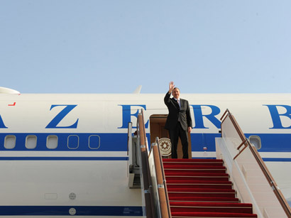 Azerbaijani President returns from London