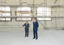 President Ilham Aliyev inspects redevelopment work at National Flag Square and adjacent area (PHOTO)