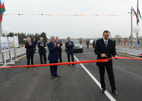 Ilham Aliyev opens newly overhauled bridge of Saatli-Musali-Mazrali highway over Araz River (PHOTO)