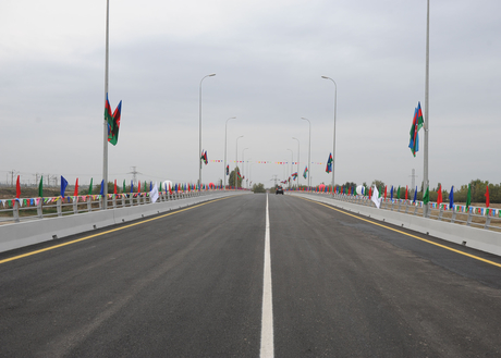 Ilham Aliyev opens newly overhauled bridge of Saatli-Musali-Mazrali highway over Araz River (PHOTO)