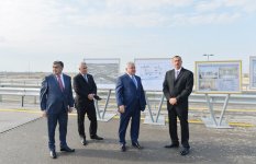 Azerbaijani President attends opening of highway to Qala residential area (PHOTO)