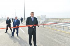 Azerbaijani President attends opening of highway to Qala residential area (PHOTO)