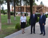 President Ilham Aliyev inspects construction work at Heydar Aliyev Center in Oghuz (PHOTO)