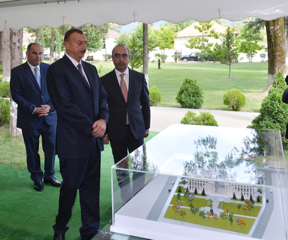 President Ilham Aliyev inspects construction work at Heydar Aliyev Center in Oghuz (PHOTO)