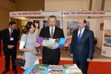 Azerbaijani president and his spouse attend exhibitions in Baku (PHOTO)