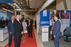 Azerbaijani president and his spouse attend exhibitions in Baku (PHOTO)