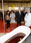 Azerbaijani president and his spouse attend exhibitions in Baku (PHOTO)