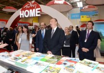 Azerbaijani president and his spouse attend exhibitions in Baku (PHOTO)