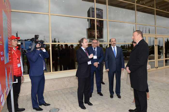 Azerbaijani president and his spouse attend exhibitions in Baku (PHOTO)