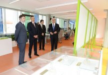 Azerbaijani president attends opening of a cement plant in Baku (PHOTO)