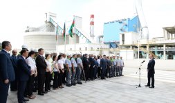 Azerbaijani president attends opening of a cement plant in Baku (PHOTO)