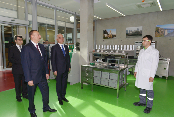 Azerbaijani president attends opening of a cement plant in Baku (PHOTO)