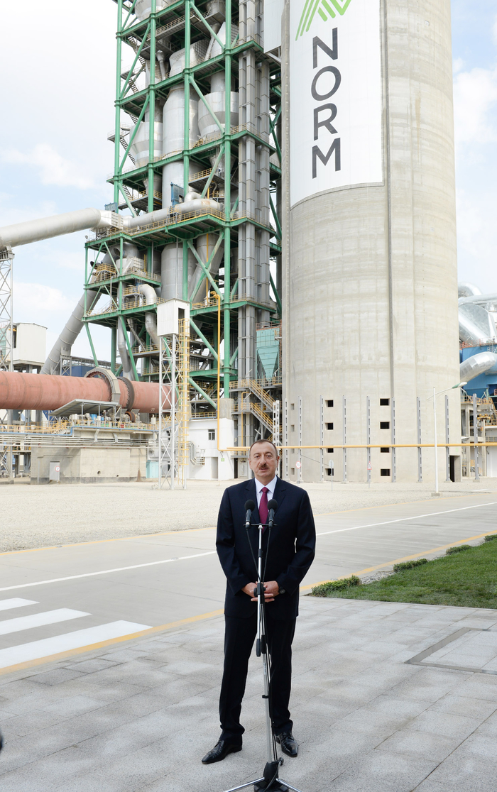 Azerbaijani president attends opening of a cement plant in Baku (PHOTO)