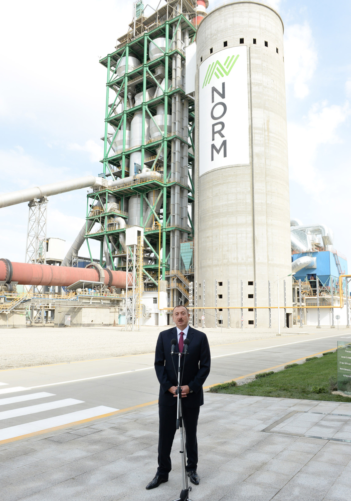 Azerbaijani president attends opening of a cement plant in Baku (PHOTO)