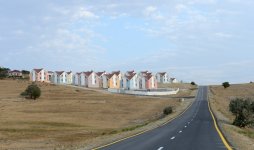 Azerbaijani president reviews 25 newly-built private houses in Khizi