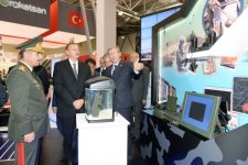 President Ilham Aliyev visits first Azerbaijan international defense industry exhibition
