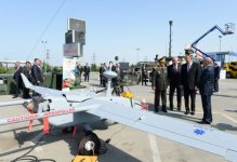 President Ilham Aliyev visits first Azerbaijan international defense industry exhibition