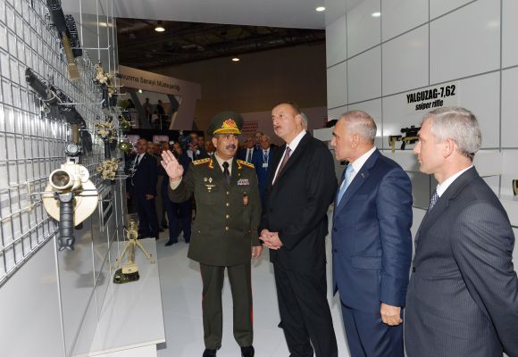 President Ilham Aliyev visits first Azerbaijan international defense industry exhibition
