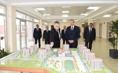 President Ilham Aliyev reviews newly-built residential complex for IDP families in Mingachevir