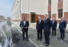 President Ilham Aliyev reviews newly-built residential complex for IDP families in Mingachevir