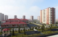 President Ilham Aliyev reviews newly-built residential complex for IDP families in Mingachevir