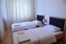 President Ilham Aliyev reviews newly-built residential complex for IDP families in Mingachevir