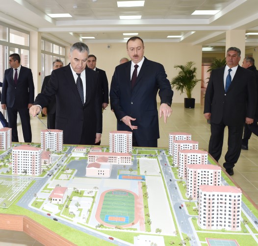 President Ilham Aliyev reviews newly-built residential complex for IDP families in Mingachevir