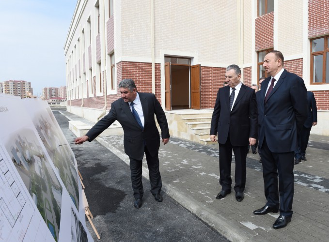President Ilham Aliyev reviews newly-built residential complex for IDP families in Mingachevir
