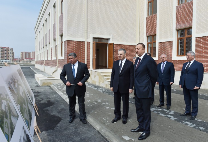 President Ilham Aliyev reviews newly-built residential complex for IDP families in Mingachevir