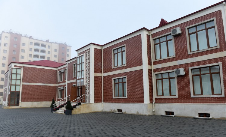 President Ilham Aliyev reviews newly-built residential complex for IDP families in Mingachevir