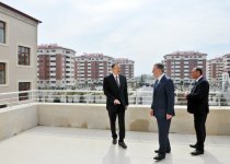 President Ilham Aliyev reviews newly-built residential complex for IDP families in Barda