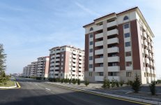 President Ilham Aliyev reviews newly-built residential complex for IDP families in Barda