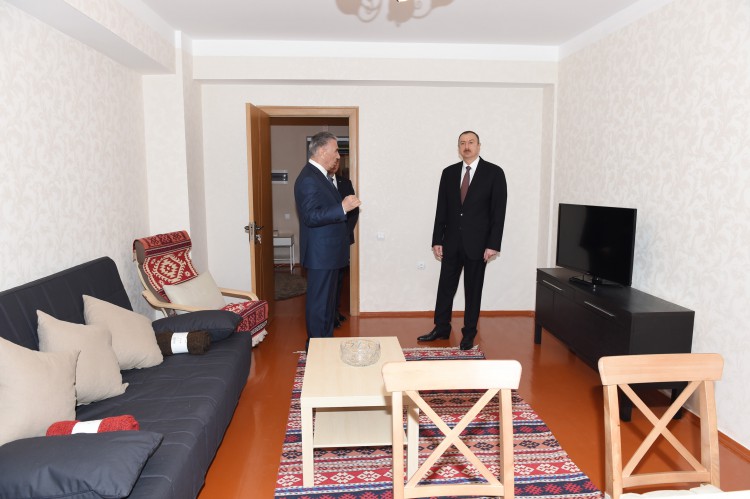 President Ilham Aliyev reviews newly-built residential complex for IDP families in Barda