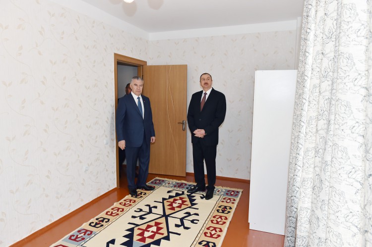 President Ilham Aliyev reviews newly-built residential complex for IDP families in Barda