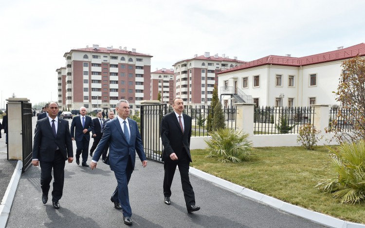 President Ilham Aliyev reviews newly-built residential complex for IDP families in Barda