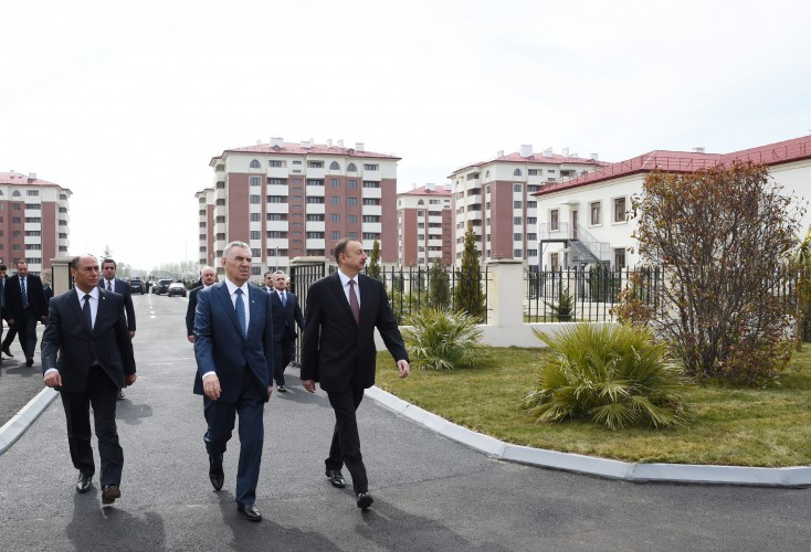 President Ilham Aliyev reviews newly-built residential complex for IDP families in Barda