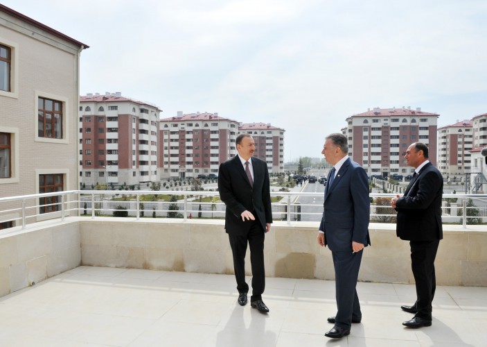 President Ilham Aliyev reviews newly-built residential complex for IDP families in Barda