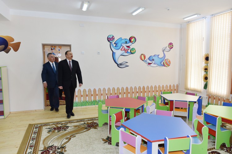 President Ilham Aliyev reviews newly-built residential complex for IDP families in Barda