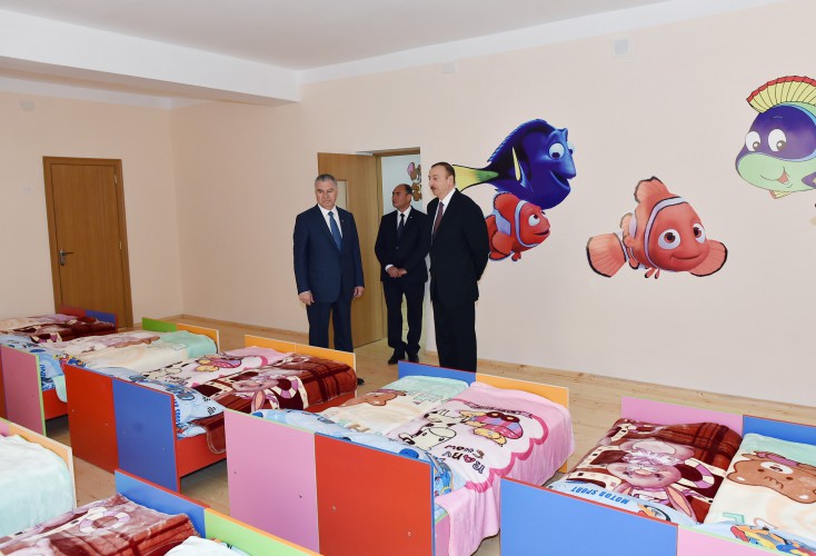 President Ilham Aliyev reviews newly-built residential complex for IDP families in Barda