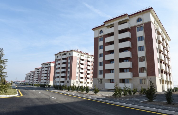 President Ilham Aliyev reviews newly-built residential complex for IDP families in Barda