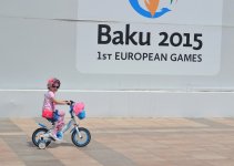 Youth pushing pedals on Baku Boulevard on eve of European Games