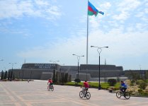 Youth pushing pedals on Baku Boulevard on eve of European Games