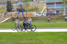 Youth pushing pedals on Baku Boulevard on eve of European Games