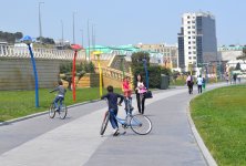 Youth pushing pedals on Baku Boulevard on eve of European Games