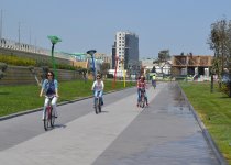 Youth pushing pedals on Baku Boulevard on eve of European Games