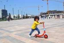 Youth pushing pedals on Baku Boulevard on eve of European Games